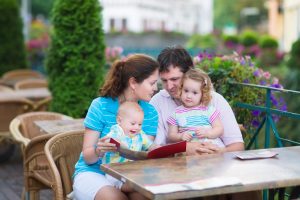 Family at an outside cafe